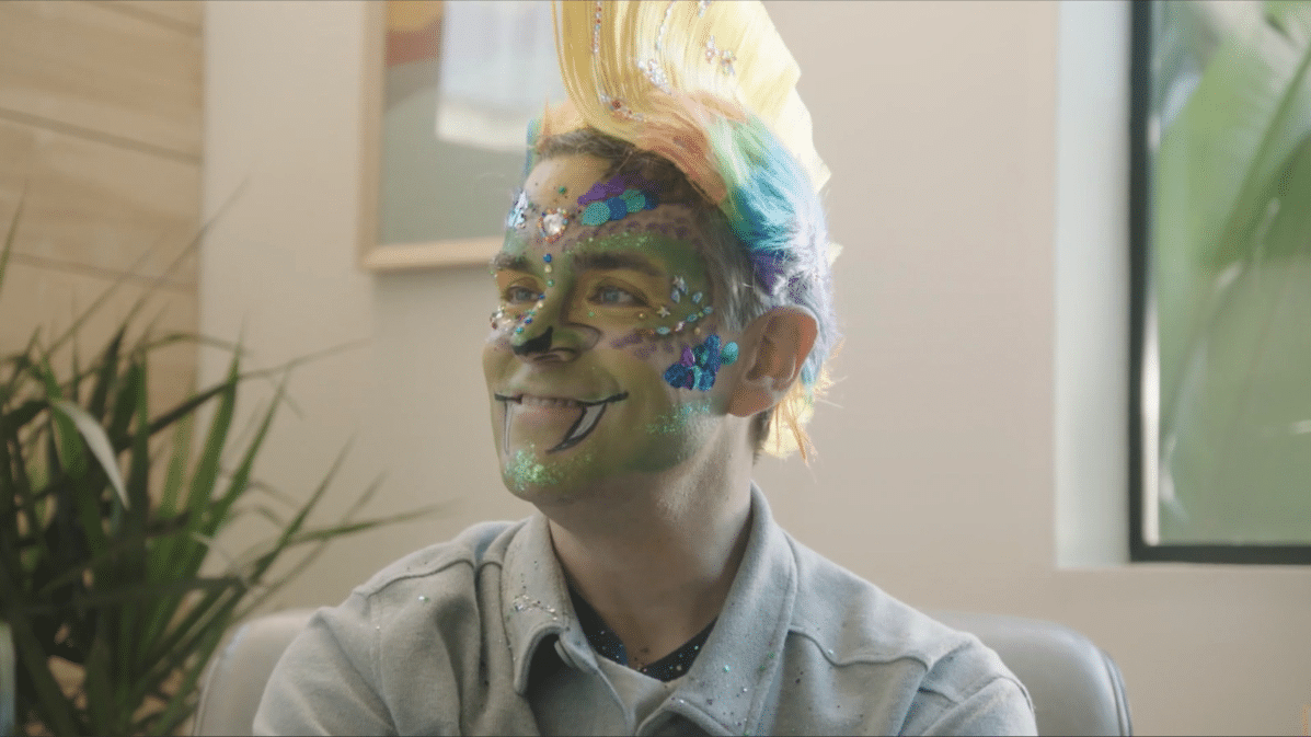 a man wearing face paint.